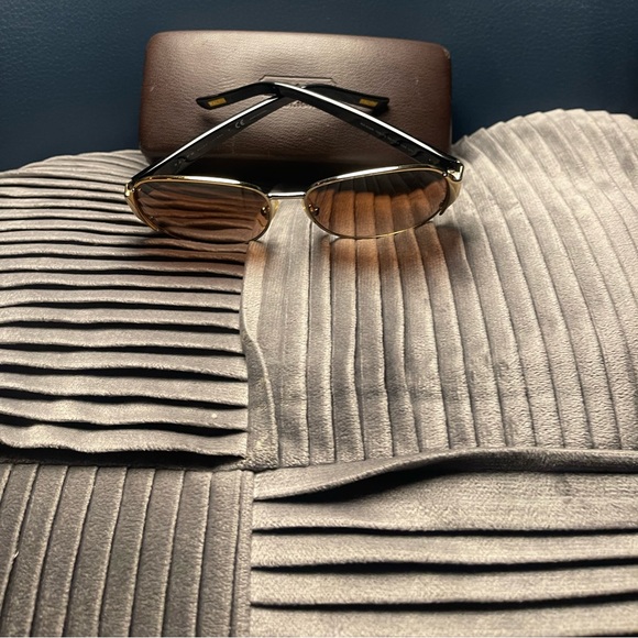 Brown coach sunglasses had these for awhile very sturdy and wears very nicely - Picture 2 of 6